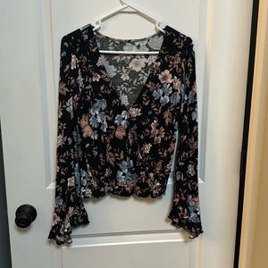 Size small soft and sexy long sleeve, flair sleeves, black with flower print